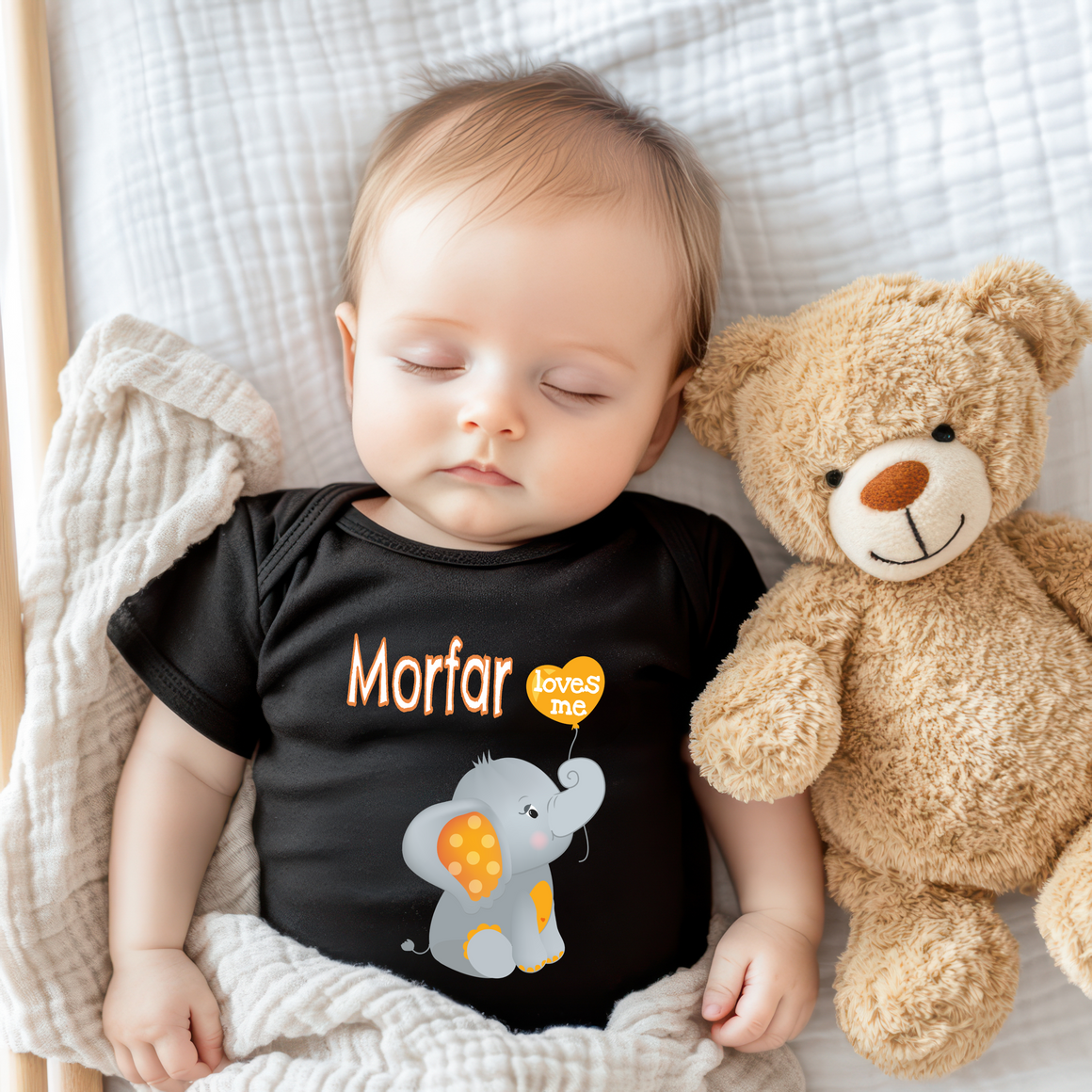 A baby sleeping peacefully next to a teddy bear.