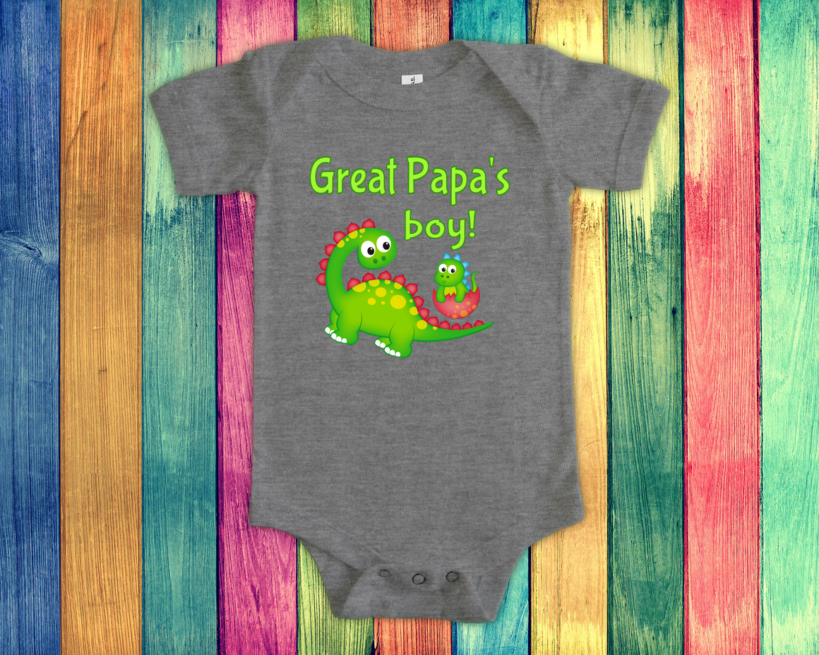 A gray baby onesie with a green dinosaur graphic and text that says "Great Papa's boy!"