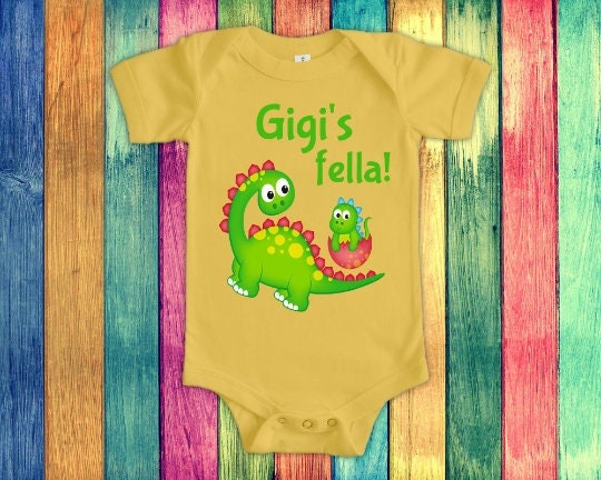 Gigi's Fella Cute Grandma Name Dinosaur Baby Bodysuit, Tshirt or Toddler Shirt Special Grandmother Gift or Pregnancy Reveal Announcement